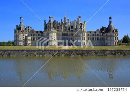 Chambord Castle reflected on the water, an ancient French castle 135233754