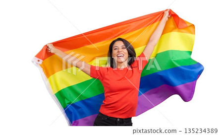 Happy woman celebrating LGBTQ plus community with rainbow flag 135234389