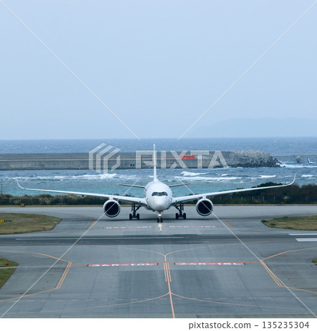 Airplane on the runway 135235304