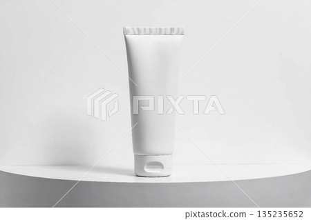 White tube mockup on pedestal on white isolated background. Concept of beauty products, face and body skin care. Image for your design 135235652