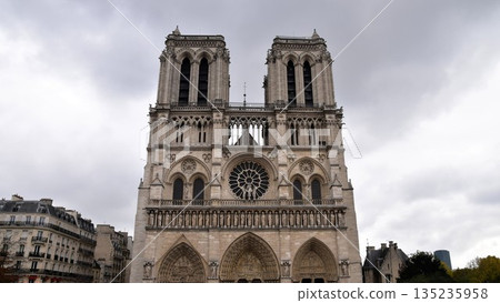 Notre Dame Cathedral, a World Heritage Site symbolizing Paris, France. Its majestic facade is a masterpiece of Gothic architecture. Notre Dame Cathedral, a World Heritage Site symbolizing Paris, France. Its majestic facade is a masterpiece of Gothic architecture. 135235958