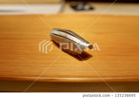 The essence of Edomae sushi: gizzard shad (small fin) nigiri prepared by a craftsman The essence of Edomae sushi: gizzard shad (small fin) nigiri prepared by a craftsman 135236695