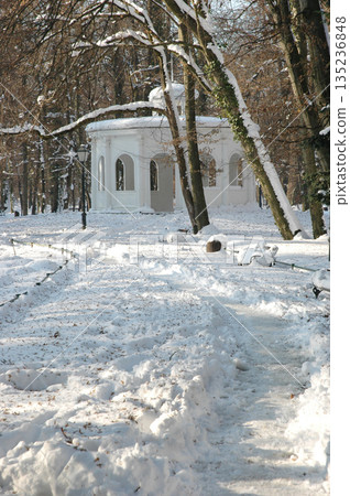 White gazebo pavilion in snow covered Maksimir Park 135236848