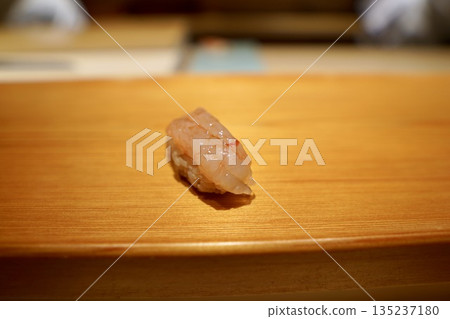 Meltingly sweet and clear, fresh sweet shrimp nigiri sushi, a piece of premium Edomae sushi 135237180