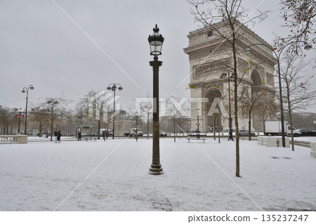 The Arc de Triomphe and Place Charles de Gaulle in Paris are covered in snow during a heavy snowfall on January 7, 2026. The Arc de Triomphe and Place Charles de Gaulle in Paris are covered in snow during a heavy snowfall on January 7, 2026. 135237247
