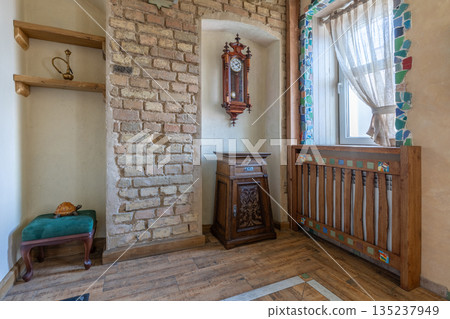 Rustic Interior with Vintage Wall Clock and Wooden Furniture Rustic Interior with Vintage Wall Clock and Wooden Furniture 135237949