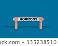 Horizons symbol. Single Wooden stick confined by  Clothespins, Cool Blue Background. Business and Horizons concept with copy space 135238510