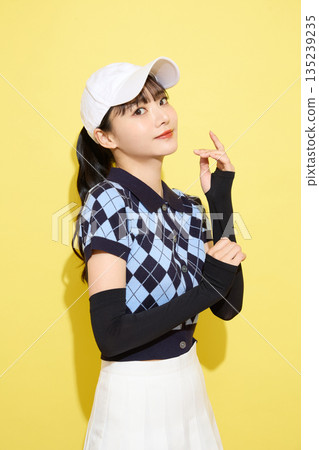 Portrait of a young woman wearing cute sportswear against a light background 135239235
