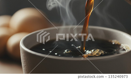 Hot Black Coffee Being Poured into Cup with Steam 4k ai 135240973