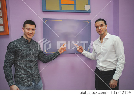 Two male student in classroom Two male student in classroom 135242109