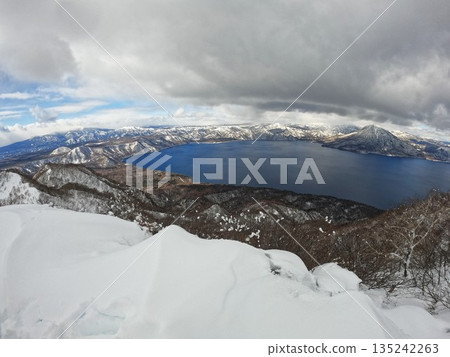 Lake Shikotsu and Mount Eniwa from the summit of Mount Fufusidake in winter Lake Shikotsu and Mount Eniwa from the summit of Mount Fufusidake in winter 135242263