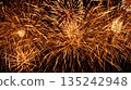 Festive grandiose fireworks festival. Out of focus. Multicolored motion blur splashes of fire. Pyrotechnics. 135242948