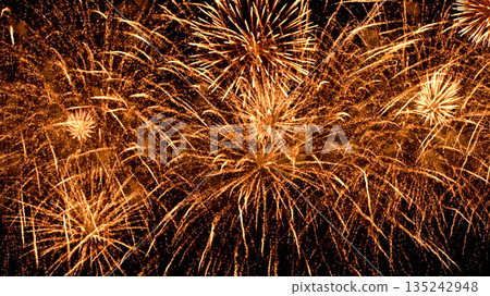 Festive grandiose fireworks festival. Out of focus. Multicolored motion blur splashes of fire. Pyrotechnics. Festive grandiose fireworks festival. Out of focus. Multicolored motion blur splashes of fire. Pyrotechnics. 135242948