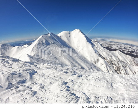 Mount Shari seen from the summit of Mount Higashisharidake in winter Mount Shari seen from the summit of Mount Higashisharidake in winter 135243216