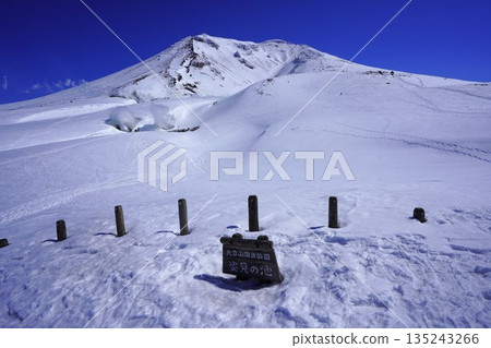 Winter Mount Asahidake seen from Sugatami Pond Winter Mount Asahidake seen from Sugatami Pond 135243266