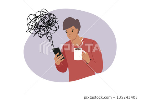 Man reads news on mobile phone, causing deterioration in mood and chaos in thoughts Man reads news on mobile phone, causing deterioration in mood and chaos in thoughts 135243405