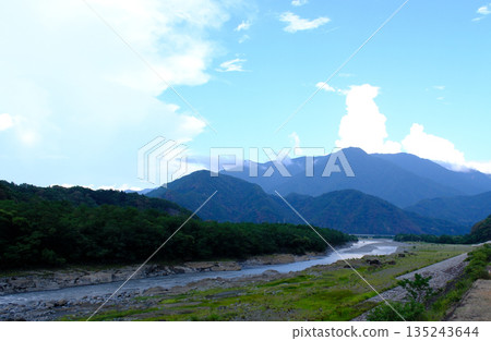 Majestic mountain scenery and river 135243644