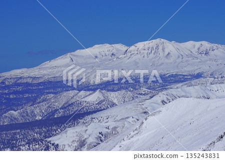 Mount Asahi from the summit of Mount Tokachi in winter Mount Asahi from the summit of Mount Tokachi in winter 135243831