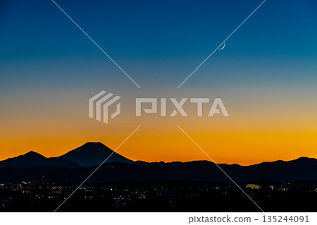 Silhouette of Mt. Fuji and crescent moon 135244091