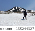 Climbers standing at Shiretoko Pass on Mount Rausu in winter 135244327