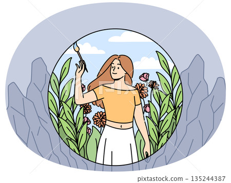 Woman draws beautiful nature around, creating favorable conditions or harmony for own life 135244387