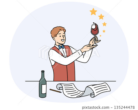 Man sommelier holds glass red wine and evaluates taste of noble alcoholic drink. Man sommelier holds glass red wine and evaluates taste of noble alcoholic drink. 135244478