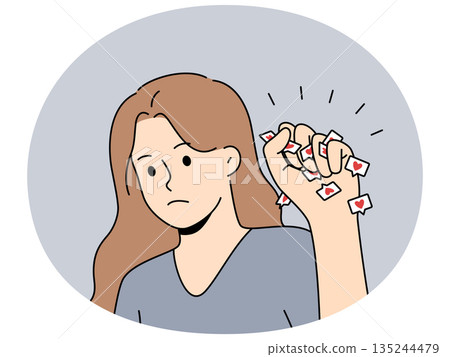 Woman struggles with social media addiction and clenches heart icons in fist to protest 135244479