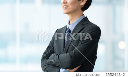 Male businessman folding his arms 135244842