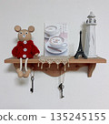 Miscellaneous items displayed on a wall rack 135245155