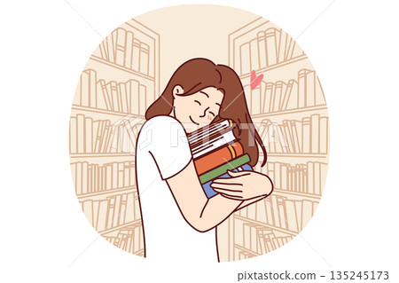 Girl hugs stack of books standing in library or bookstore and rejoicing at opportunity to read lot 135245173