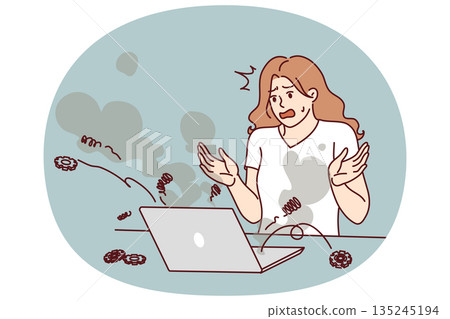 Stressed woman stands near exploding laptop and screams in fear in need of help of computer wizard 135245194