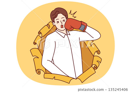 Man in boxing glove punches himself in face and peeking out of hole in torn paper. Man in boxing glove punches himself in face and peeking out of hole in torn paper. 135245406