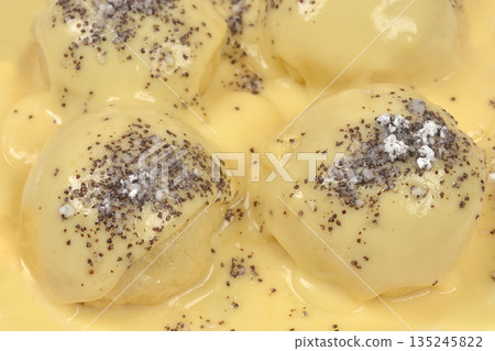 Traditional sweet dumplings with vanilla sauce Traditional sweet dumplings with vanilla sauce 135245822