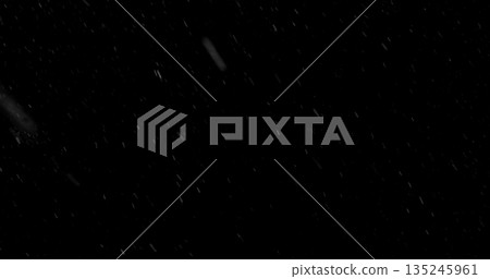 Freeze motion of Falling Realistic Snow Captured on a Pure Black Background. Perfect as a VFX or Compositing Overlay for Winter Atmospheres and Visual Effects.Freeze motion of Falling Realistic Snow 135245961