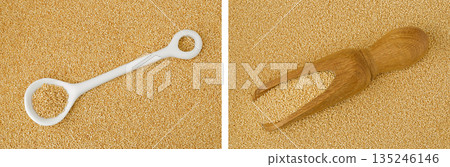 Amaranth grain seeds in ceramic spoon and wooden scoop as a background. Top view. Flat lay 135246146