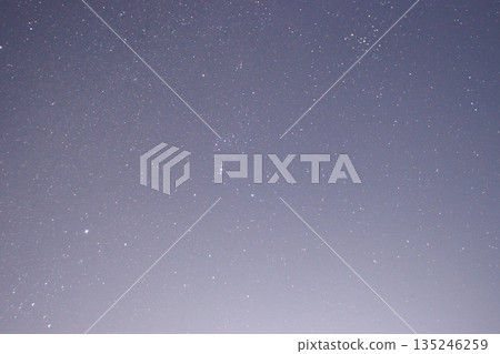 Starry sky background in a clear winter night sky Starry sky background in a clear winter night sky 135246259
