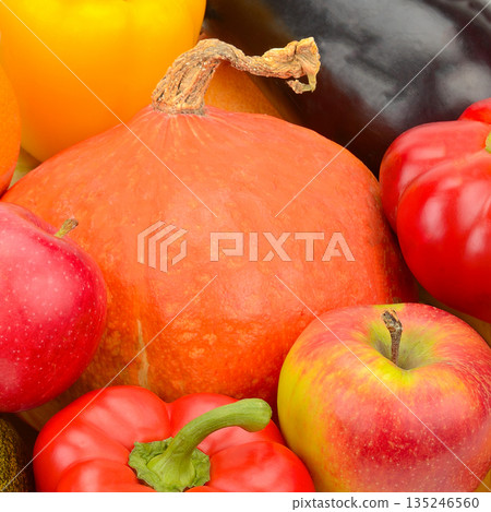 Vibrant assortment of organic vegetables and fruits in a tight composition. Vibrant assortment of organic vegetables and fruits in a tight composition. 135246560