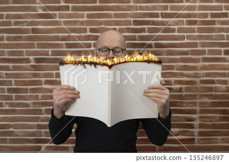 Reading a burning book 135246897