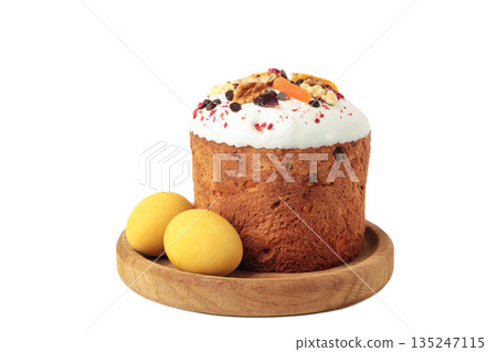 Traditional easter cakes with colorful sprinkles, with eggs isolated on white background. 135247115