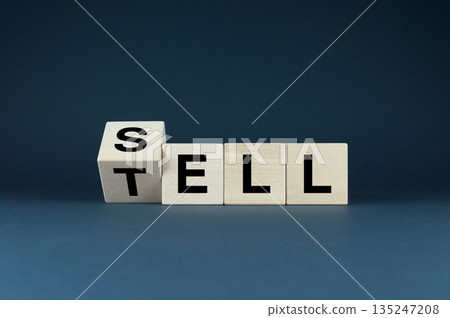 Wooden blocks with the words Sell and Tell 135247208