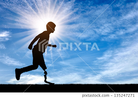 Silhouette of determined disabled boy runner with prosthetic leg Silhouette of determined disabled boy runner with prosthetic leg 135247271