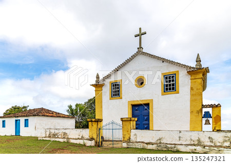 Old colonial-style house and church Old colonial-style house and church 135247321