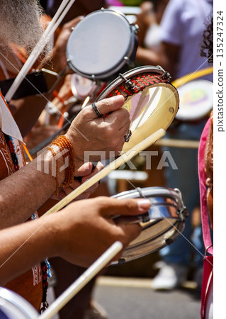 Tambourines and musicians 135247324