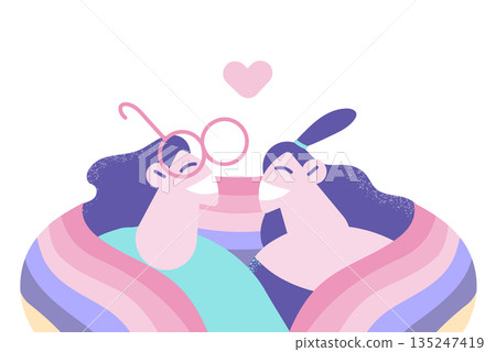 Happy lesbian couple covered in LGBT flag 135247419