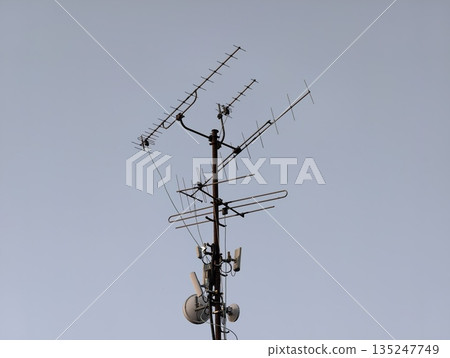 rusty mast and antennas on urban rooftop evoke nostalgic broadcast and connection themes rusty mast and antennas on urban rooftop evoke nostalgic broadcast and connection themes 135247749