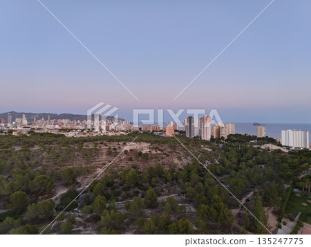 pastel coastal sunset, tranquil coastal scene during dusk with pastel colors and scenic surroundings 135247775