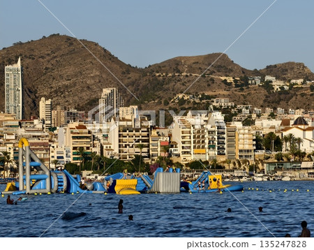 enjoying sunset on paddleboard, experiencing tranquil sunset vibes during paddleboarding adventure enjoying sunset on paddleboard, experiencing tranquil sunset vibes during paddleboarding adventure 135247828