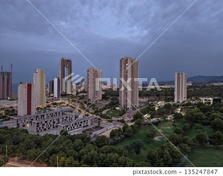 night cityscape photography, urban skyline with cranes and trees, evening aerial scene of city night cityscape photography, urban skyline with cranes and trees, evening aerial scene of city 135247847