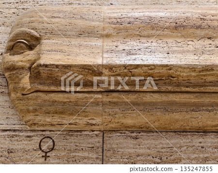 decorative stone details, travertine panel with symbols, relief carving featuring emblem decorative stone details, travertine panel with symbols, relief carving featuring emblem 135247855