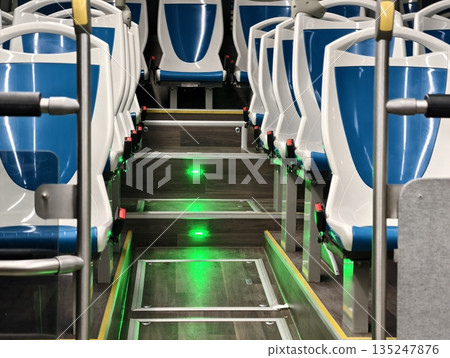 modern bus with advanced features, sleek bus cabin designed for night journeys and routine checks 135247876